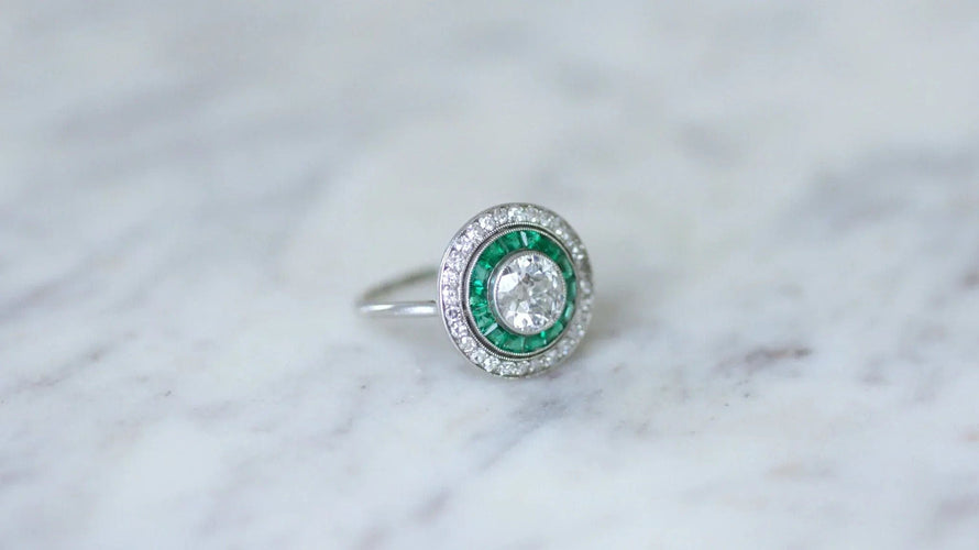 Bague Bague cible halo diamant et émeraudes calibrées 58 Facettes