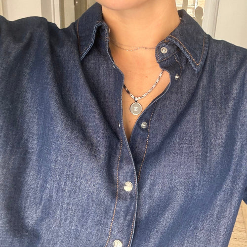 Collier CARTIER - chaîne et médaillon vintage en or blanc 58 Facettes