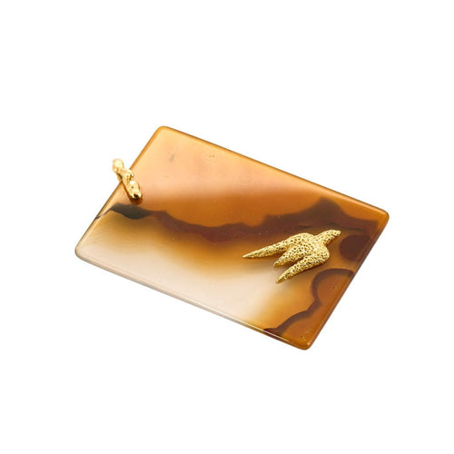 Pendentif Pendentif en agate, motif d'oiseau en or jaune reprenant une gouache de Georges Braque 58 Facettes 250110