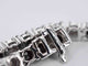 Bracelet Bracelet de tennis en or blanc serti de diamants noirs et blancs 58 Facettes 2119