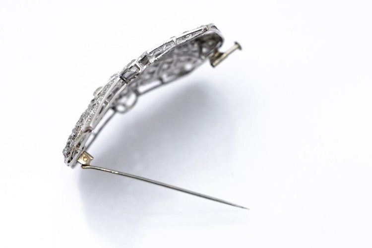 Broche Broche Art déco en platine et diamants 6,85 ct 58 Facettes PLT7
