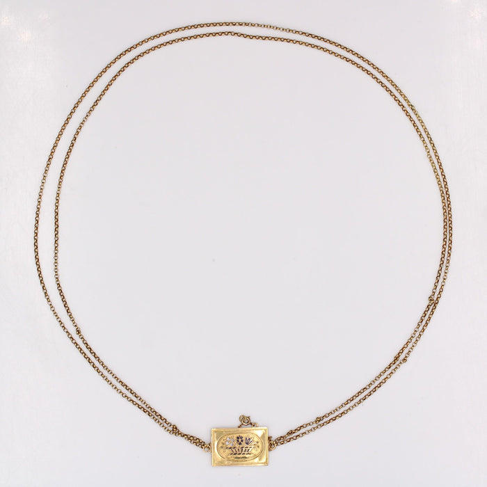 Old double row gold necklace and its enameled clasp