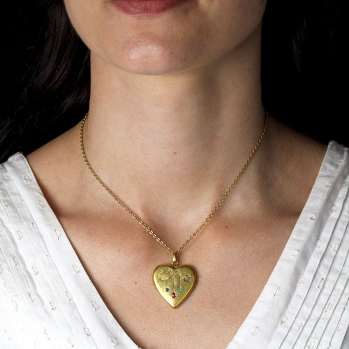 Pendentif Médaillon ancien coeur rubis saphir émeraude et perles 58 Facettes 24-030