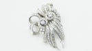 Broche Broche Art déco double clips en or blanc et platine, diamants 58 Facettes 32946