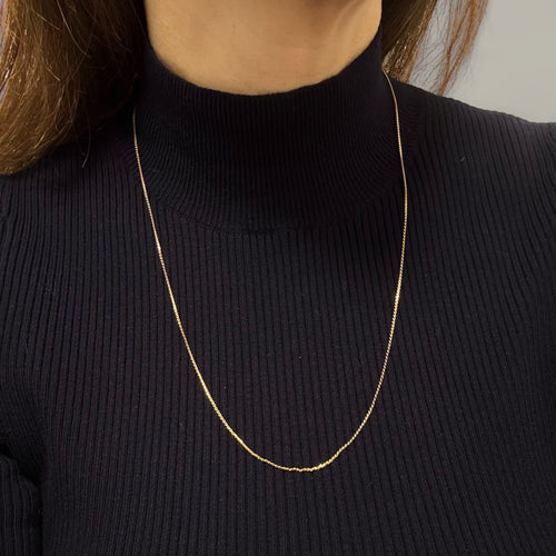 Collier Chaîne fine maille plate en or jaune 18k 58 Facettes REF2564-332