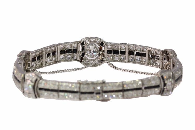 Häikäisevä julistus Art Deco: Rannekoru Platina, jossa on timantteja ja onyksia 