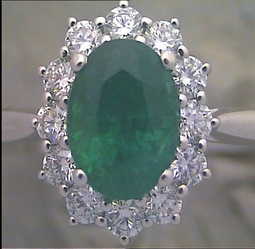 Bague Bague avec émeraude et diamants 58 Facettes