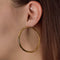 Boucles d'oreilles Boucles d'oreilles créoles en Or jaune 58 Facettes AMI1033