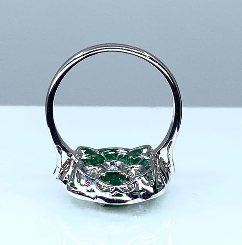 Bague Bague marguerite en or blanc 18 carats en émeraudes et diamants 58 Facettes AB216