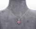 Collier Collier en or blanc orné d'un rubis du Mozambique de 0,76 ct et de diamants 58 Facettes 9659