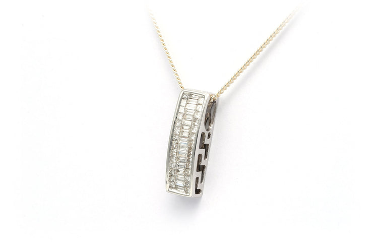 Contemporary pendant in 18-carat white gold set with baguette-cut and princess-cut diamonds (+-0.56ct) 