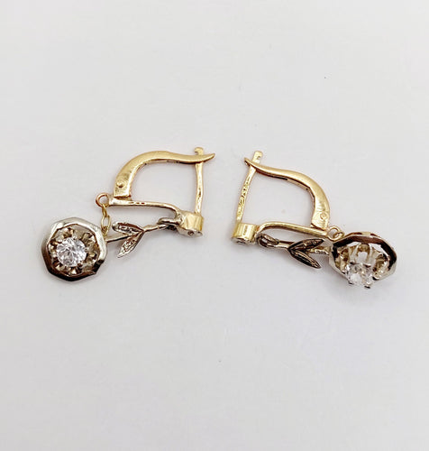 Boucles d'oreilles Dormeuses antique or jaune 18k fleur et spinelles blancs (circa 1920) 58 Facettes A06159