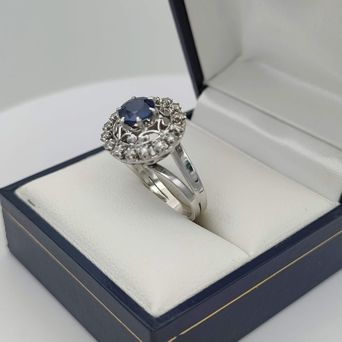 White gold ring and platinum, sapphire, diamonds