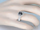 Bague 54 Bague entourage en or blanc avec gros diamants et un diamant noir 58 Facettes 2049