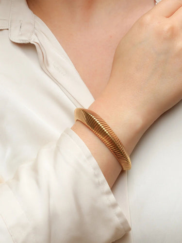 Bracelet Bracelet tubogas vintage or jaune 58 Facettes J439