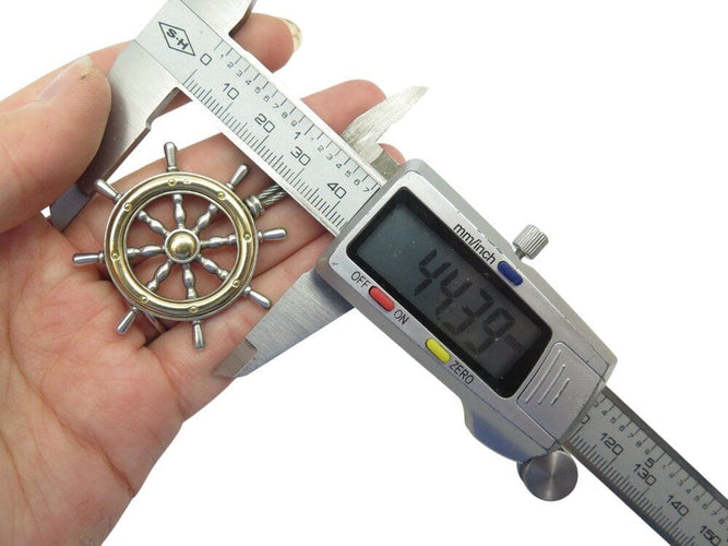 Pendentif rare vintage pendentif HERMES barre a roue en argent 800 & or jaune 18k 24.8 gr 58 Facettes 268491