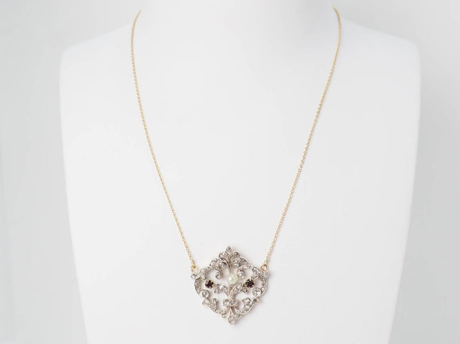 Collier Collier volutes en or jaune et argent, grenat diamants et perle 58 Facettes 33049