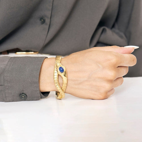 Bracelet Bracelet serpent articulé or jaune, rubis et lapis lazulli 58 Facettes BIA0926