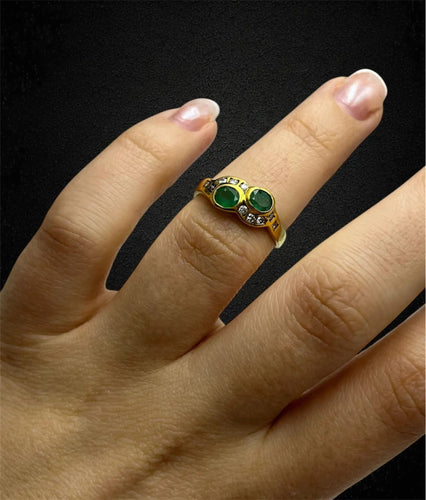 Bague Bague sinueuse ornée d'émeraudes et de diamants 58 Facettes