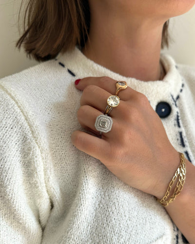 52 Double cluster diamond ring 58 Facettes