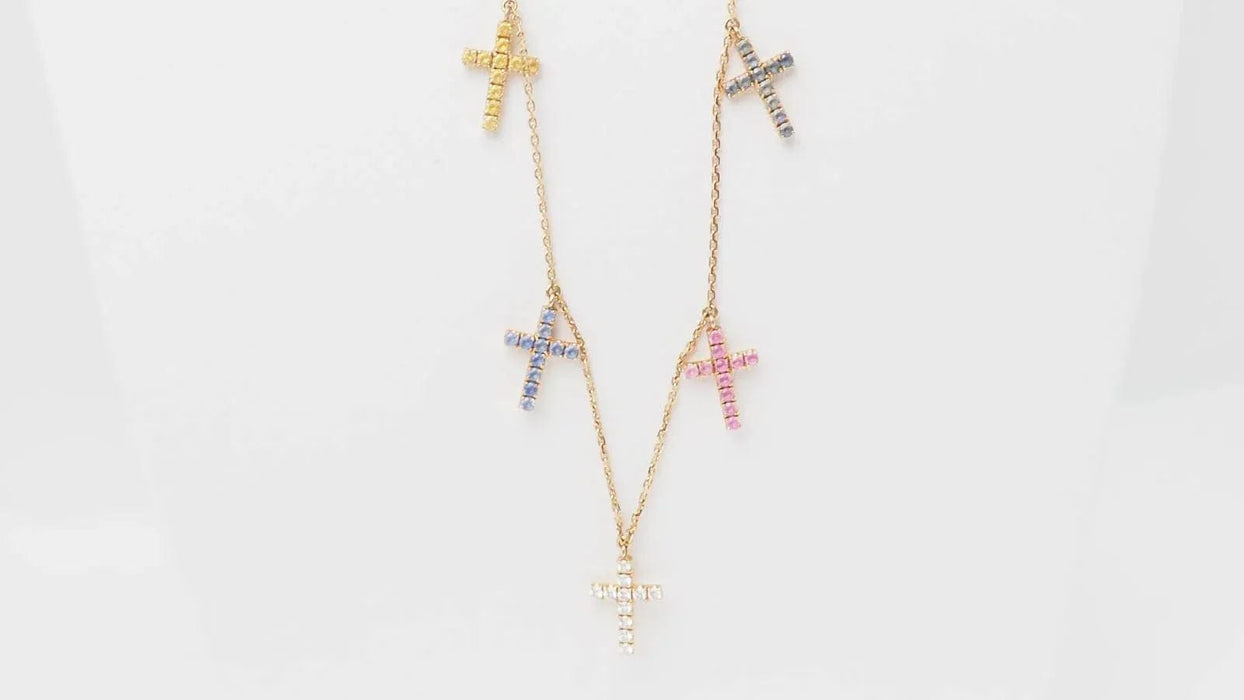 Collier CARTIER - Collier 11 Croix en or rose diamants et saphirs de couleurs 58 Facettes 32788