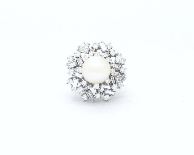 Bague Bague avec perle et diamants 58 Facettes