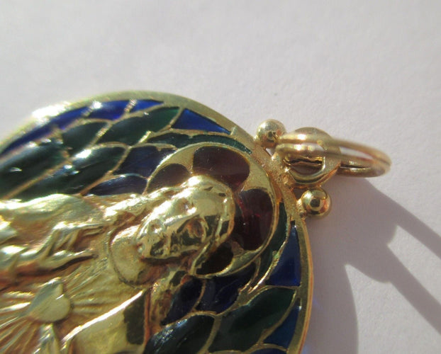 Pendentif Becker - Médaille pendentif Jésus Christ émail plique-à-jour en or jaune 18k 58 Facettes