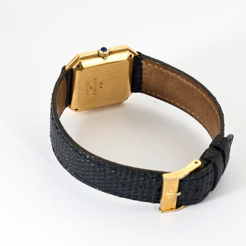 Montre Baume & Mercier - Montre Modèle Vintage en or jaune et cadran gris clair. 58 Facettes