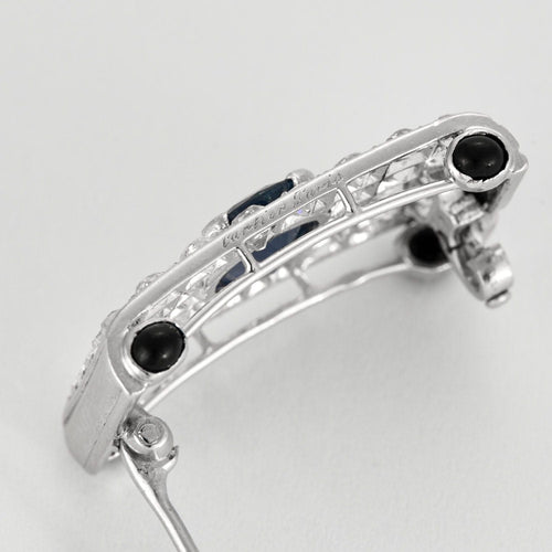 Broche CARTIER - Broche Art déco en platine, saphirs, diamants et cabochons d'onyx 58 Facettes 58FC10