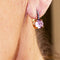Boucles d'oreilles Boucles d'oreilles en or rose, saphirs et améthyste 58 Facettes D363774UZ