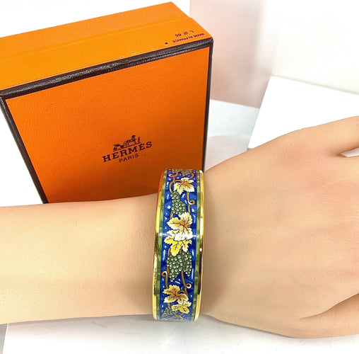 Bracelet HERMÈS - bracelet en métal doré et émail 58 Facettes AB657