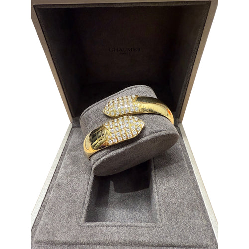 Bracelet CHAUMET - Bracelet « plume » or jaune et diamants 58 Facettes 1.0000453/1