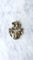 Broche Broche ancienne operculum, grenat, et porcelaine 58 Facettes