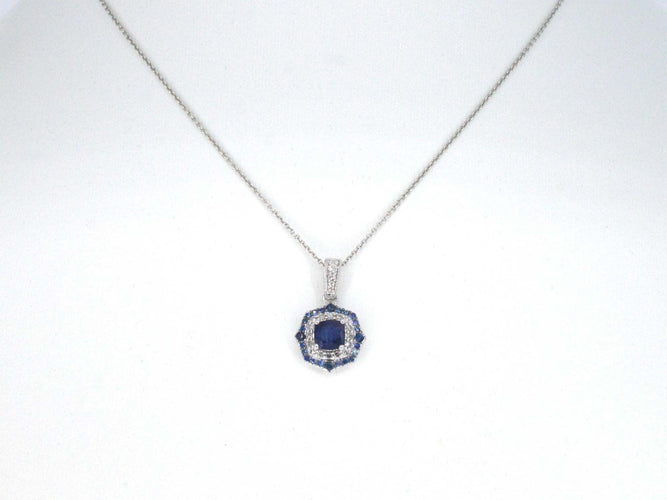 Pendentif Pendentif en or blanc avec diamants et saphir 58 Facettes 2351