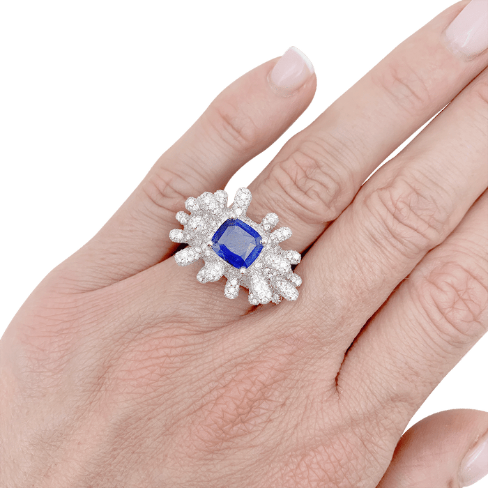 White gold, sapphire and diamond ring.