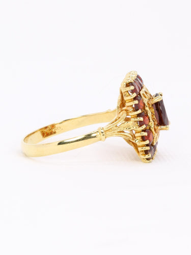 Anel vintage em ouro amarelo com granadas 