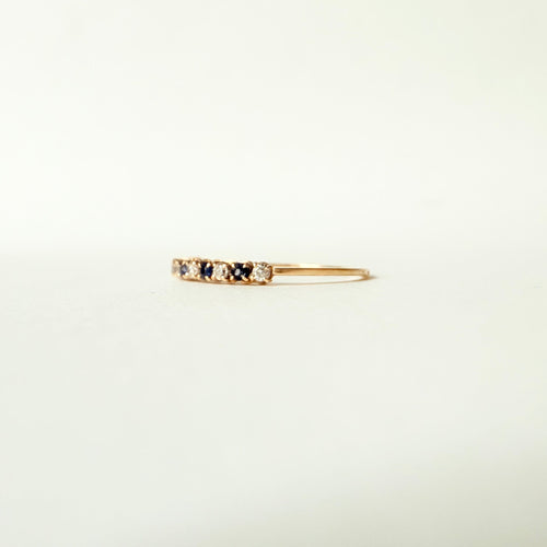 Half-eternity ring Gold, sapphires, and diamonds 