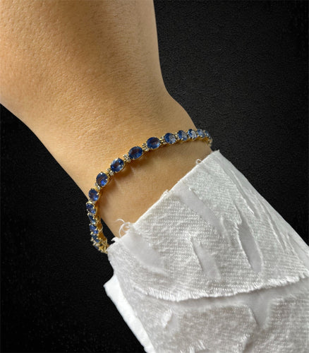 Bracelet Bracelet tennis en or jaune avec saphirs et diamants 58 Facettes