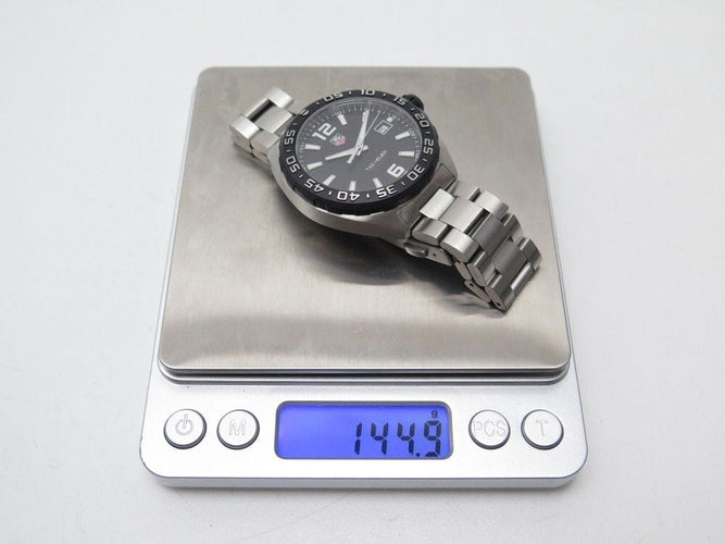 Montre montre TAG HEUER formula 1 quartz 42 mm acier & titane +boite 58 Facettes 253583