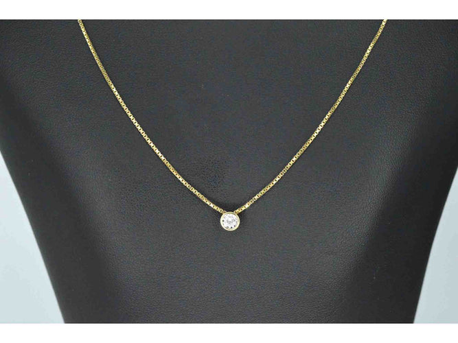 Pendentif Pendentif en or avec un diamant taille brillant 58 Facettes 2092