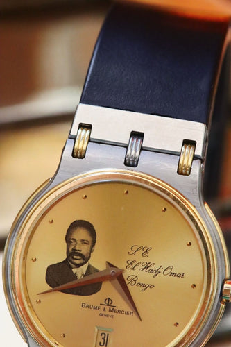 Montre Baume & Mercier - Montre 5125.037 Omar Bongo or jaune et acier 58 Facettes