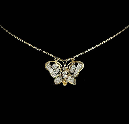 Pendentif Pendentif en forme de papillon en or bicolore 58 Facettes