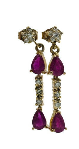 Boucles d'oreilles Boucles d'oreilles longues en or jaune avec rubis et diamants 58 Facettes 50256