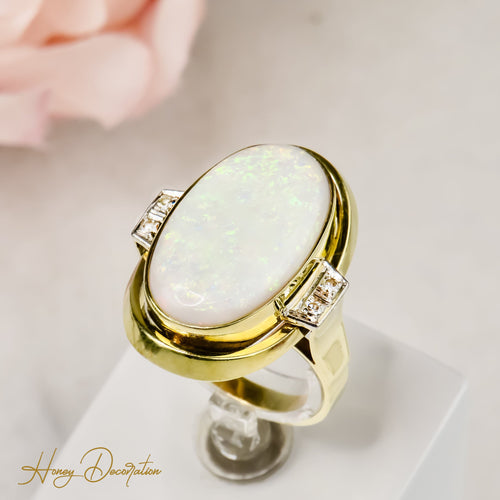 Bague 63 Magnifique bague en or et opale 58 Facettes 2619