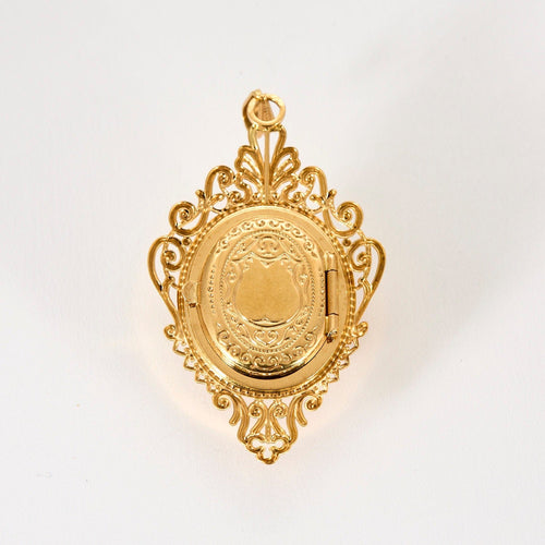 Pendentif Pendentif porte photo or jaune, perle de culture et rubis de synthèse 58 Facettes CHAL01994