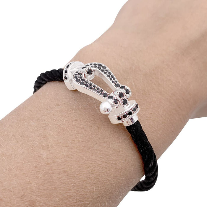 Bracelet Bracelet Fred, "Force 10", or blanc, acier et diamants noirs. 58 Facettes 33414