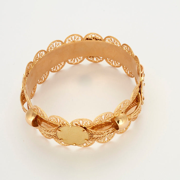 Yellow gold coin bracelet