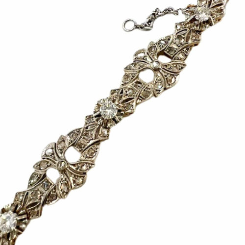 Bracelet Bracelet design Art Déco en or jaune et platine avec diamants 58 Facettes Q315B