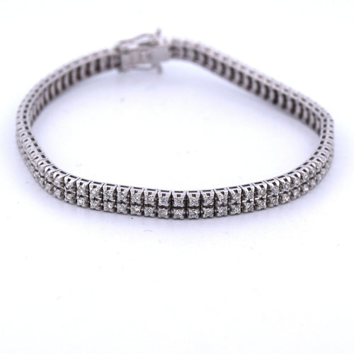 Bracelet BRACELET « TENNIS » EN OR BLANC 18 KT AVEC DIAMANTS 58 Facettes