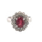 Bague 54 Bague en or blanc avec diamants et rubis central 58 Facettes